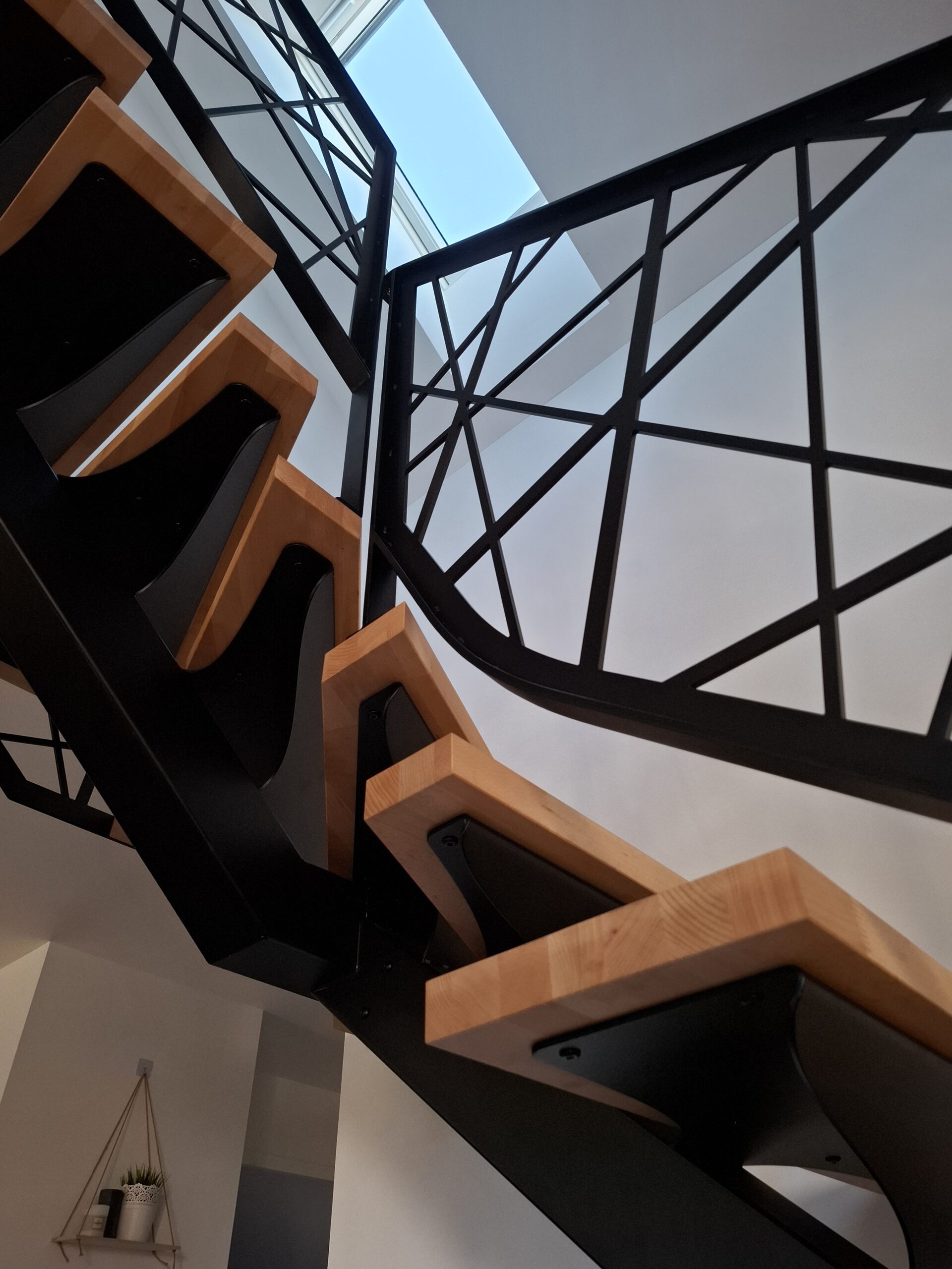 Escalier limon central demi tournant